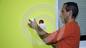 Man Installing an Electrical Switch