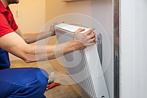 Man installing room heater