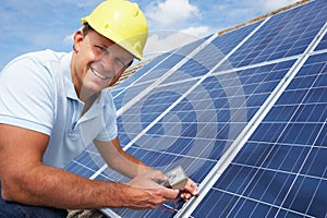 Man installing solar panels