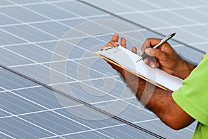 Man installing solar panels