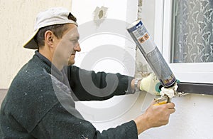 Man installing windowsill #2 photo