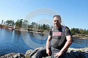 Man on island in Ladoga skerries