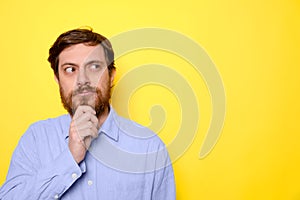 Man isolated confuse and wondering about question