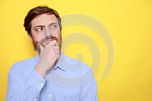 Man isolated confuse and wondering about question