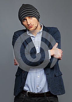 Man in jacket and hat