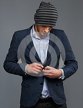 Man in jacket and hat