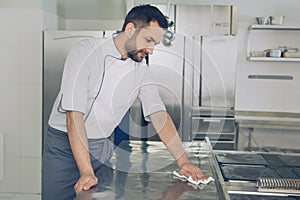 Man japanese restaurant chef working in the kitchen