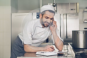 Man japanese restaurant chef working in the kitchen