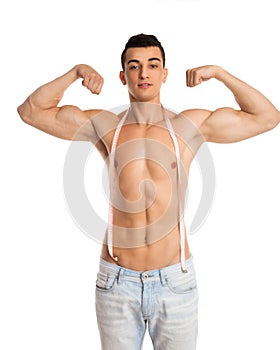 Man in jeans showing muscles