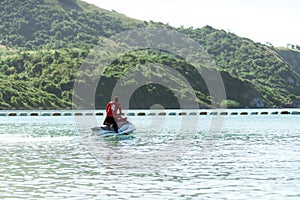 Man on Jet Ski having fun in Ocean