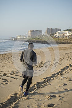 Man jogging on beach