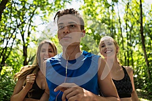 Man Jogging In Front Of Woman