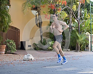Man jogging in Puerto Aventuras, Mexico photo