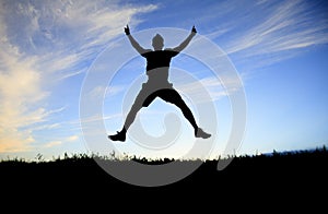 Man jump on the sunset day time