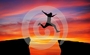 Man jumping across the gap