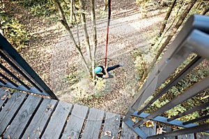 Man jumping from a bungee tower