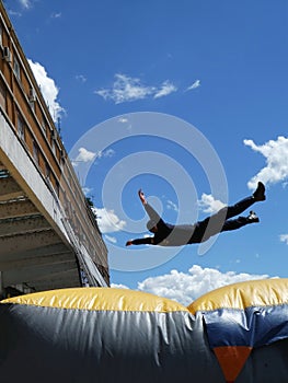 Man jumping down to the Inflatable Rescue Cushion also known as a Jump Cushion - rescuing people