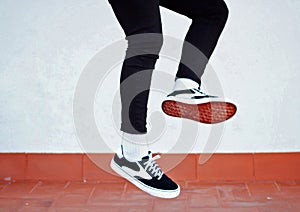 Man jumping with his new sneakers. photo