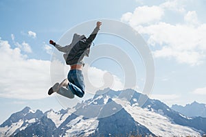 Man jumping on mountain