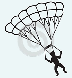 Man jumping with parachute