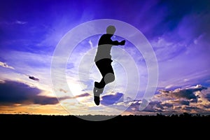 A man jumping Silhouette and sky