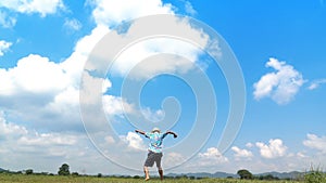 A man jumping slow motion and cloud sky background.