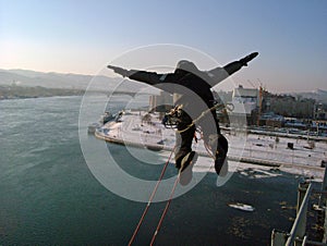 A man jumps into the abyss.