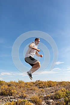 A man jumps and shouts to de-stress while exercising