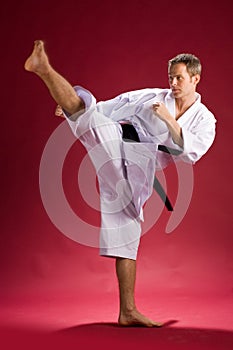 Man karate kicking