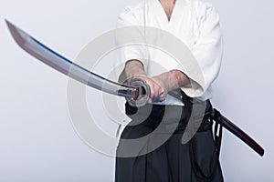 A man with katana on Iaido practice