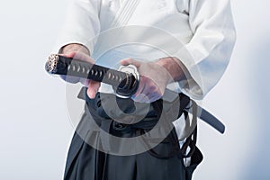 A man with katana on Iaido practice