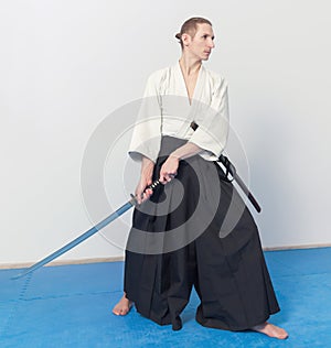 A man with katana is ready to attack