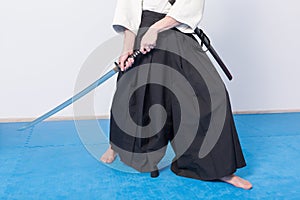 A man with katana is ready to attack