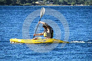 A man in kayak in a lake