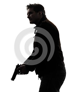 Man killer policeman holding gun silhouette