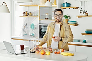 man kitchen food fruit laptop recipe juice smoothie healthy home happy cooking home computer instruction drink morning