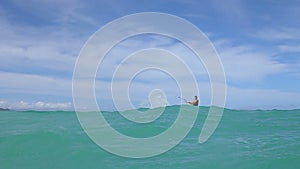 Man Kite Boarding In Ocean