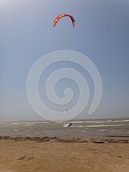Man kite surfing in Mombasa Marine Park, Kenya
