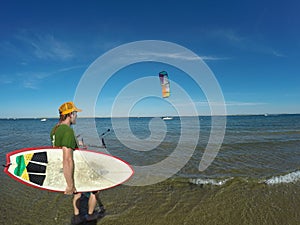 Man with Kite and Wakeboard