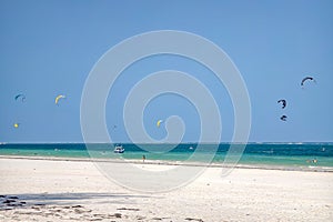 man is kitesurfing in the Caribbean sea. Diani Beach, Kenya, Mombasa.