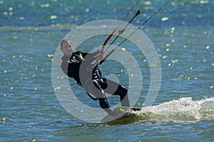 Man kiting on water