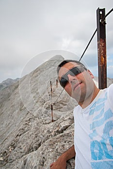 Man on Koncheto Peak on Mountain Pirin