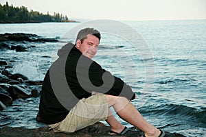 Man on Lake Superior Shore