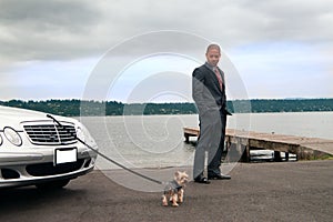 Man at Lakeside with his Dog