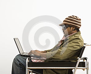 Man on laptop.