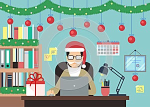 Man With Laptop In Christmas Decorations