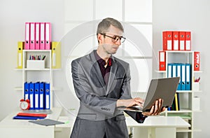 Man with laptop online job marketing specialist, digital technology concept