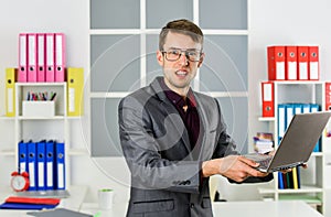 Man with laptop online job marketing specialist, hateful job concept