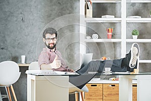 Man with laptop showing thumbs up