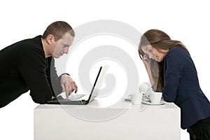 Man with laptop, wife with dishes photo